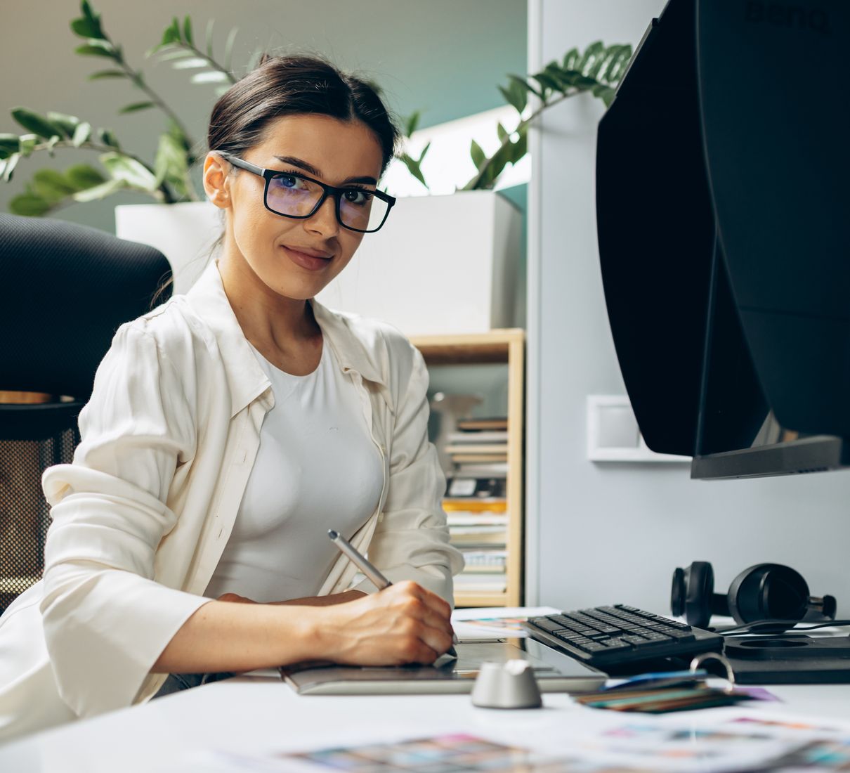 Web designer at work at her desk