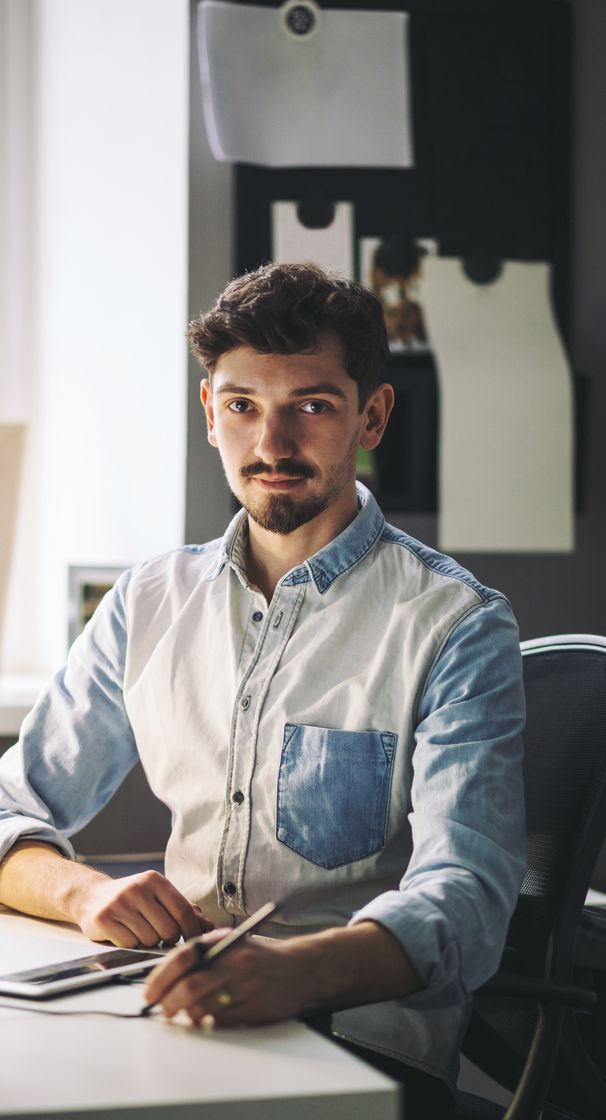 Web developer working at his desk